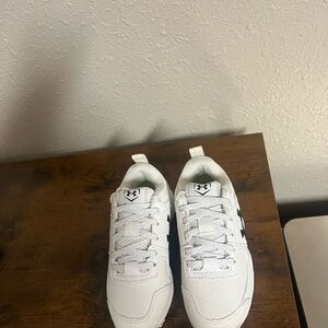 Under Armour Black and White Sports Cleats